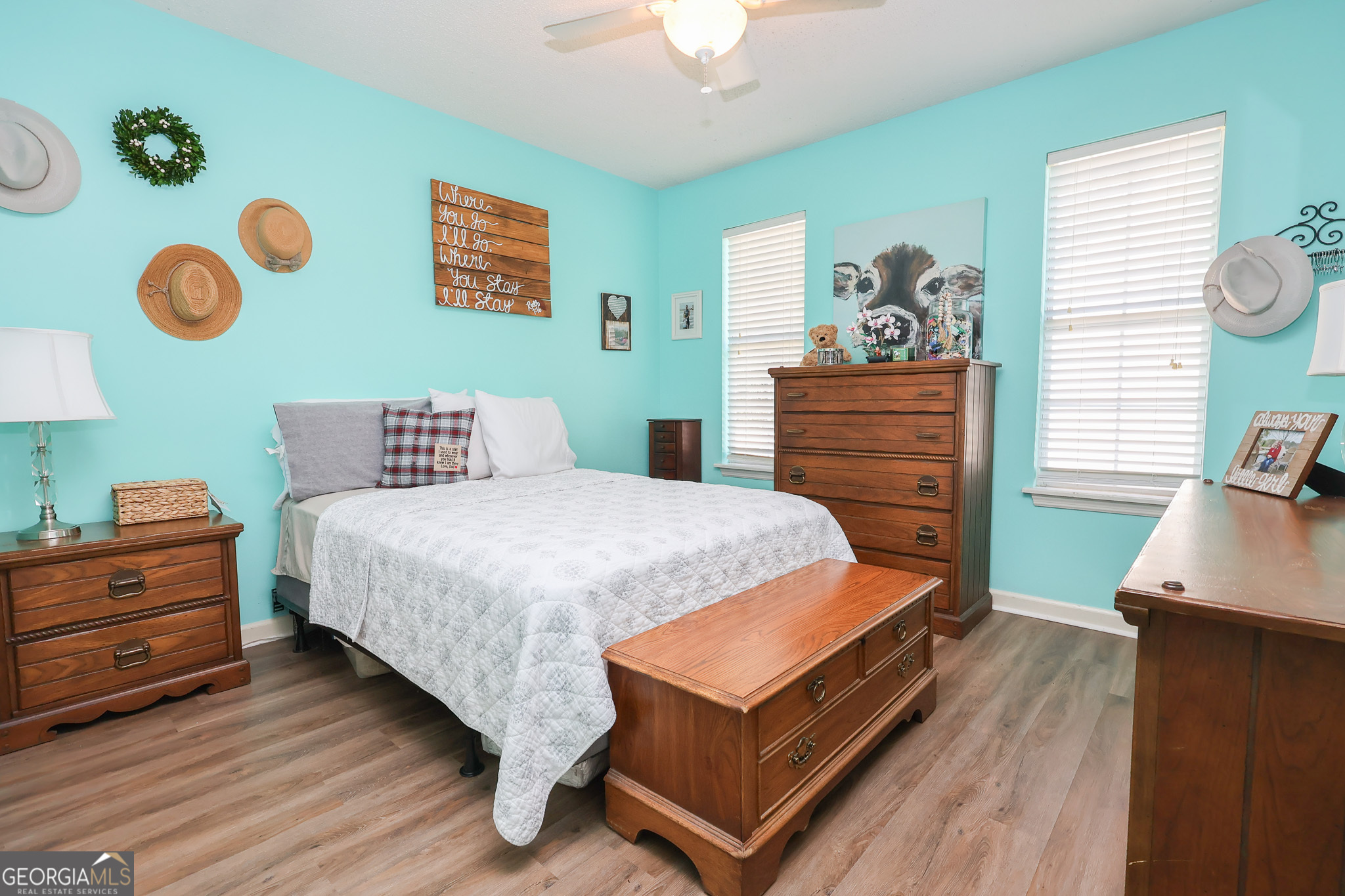 215 Stonefield Circle Macon, GA 31216 - Photo 14 of 26 a bedroom with a bed and a dresser in it