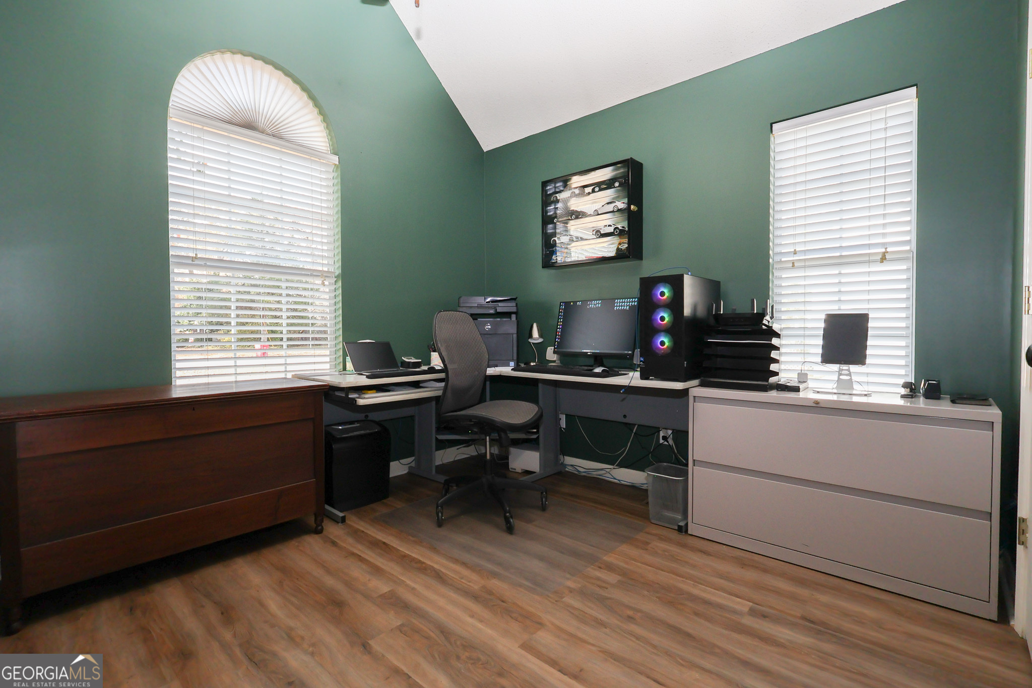 215 Stonefield Circle Macon, GA 31216 - Photo 17 of 26 a work room with furniture window and a wooden floor