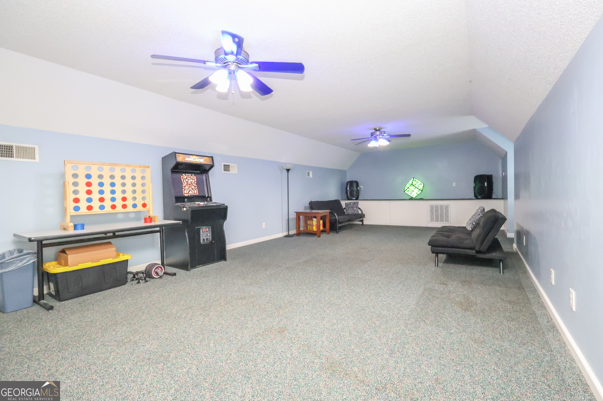 215 Stonefield Circle Macon, GA 31216 - Photo 24 of 26 a living room with furniture and a chandelier
