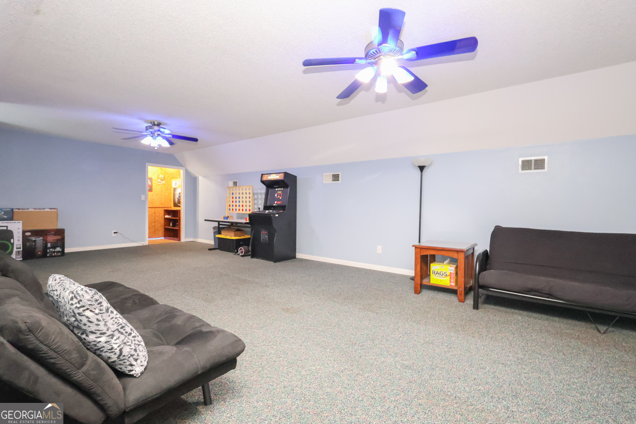 215 Stonefield Circle Macon, GA 31216 - Photo 26 of 26 a living room with furniture and a wooden floor