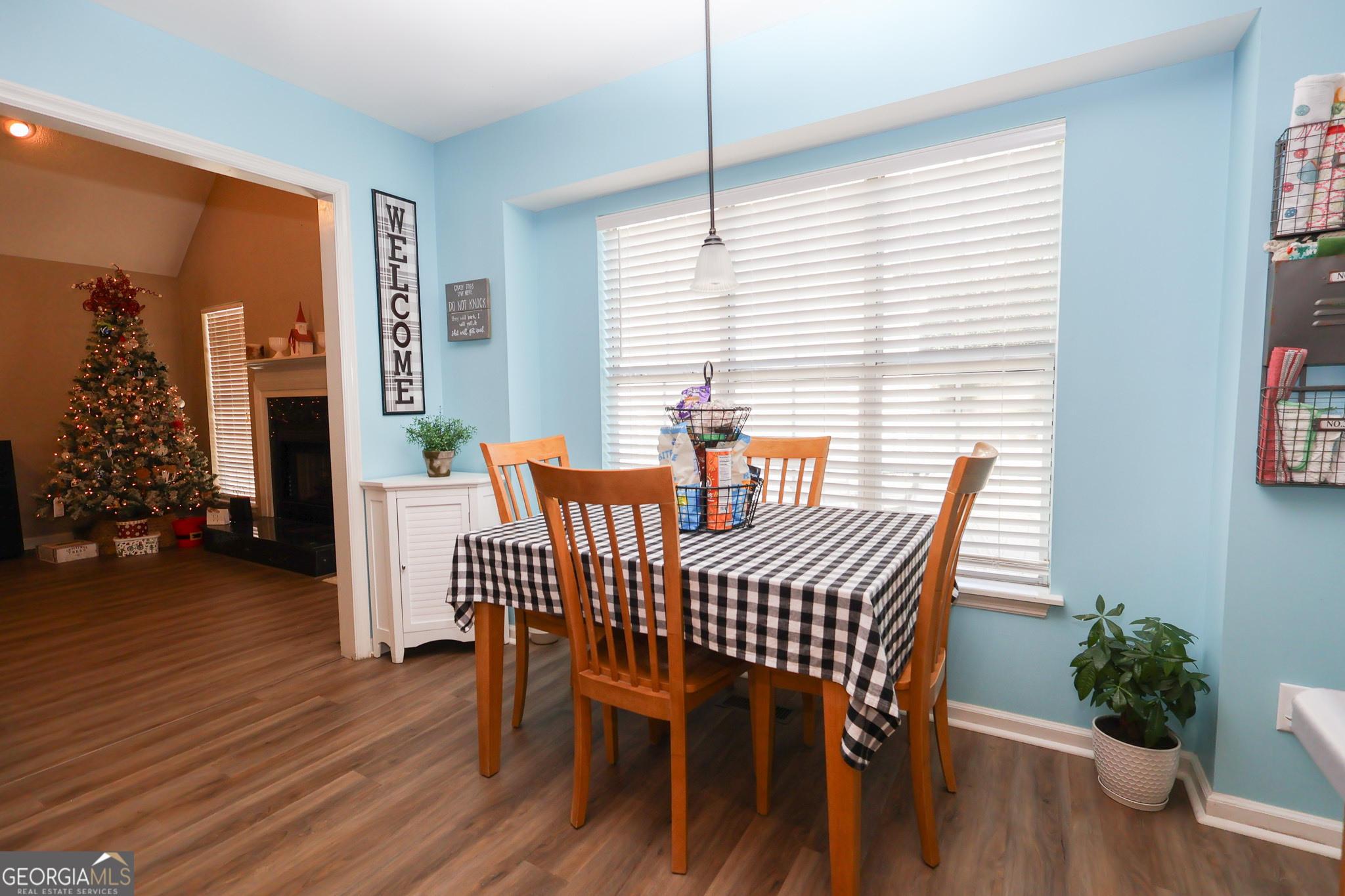 215 Stonefield Circle Macon, GA 31216 - Photo 9 of 26 a view of a dining room with furniture and wooden floor