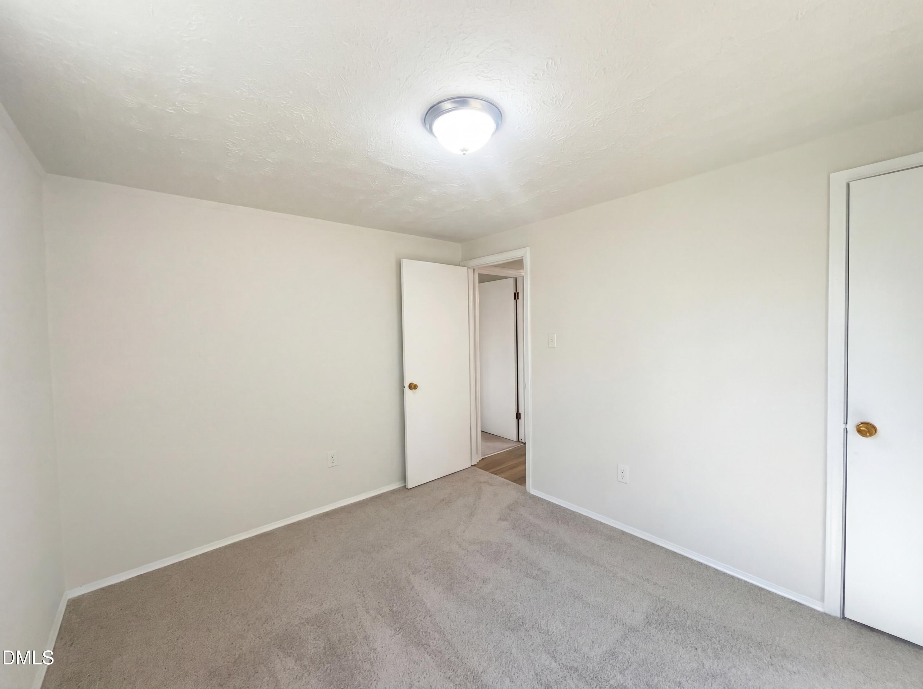 9815 Berry Road Timberlake, NC 27583 - Photo 10 of 17 a view of an empty room