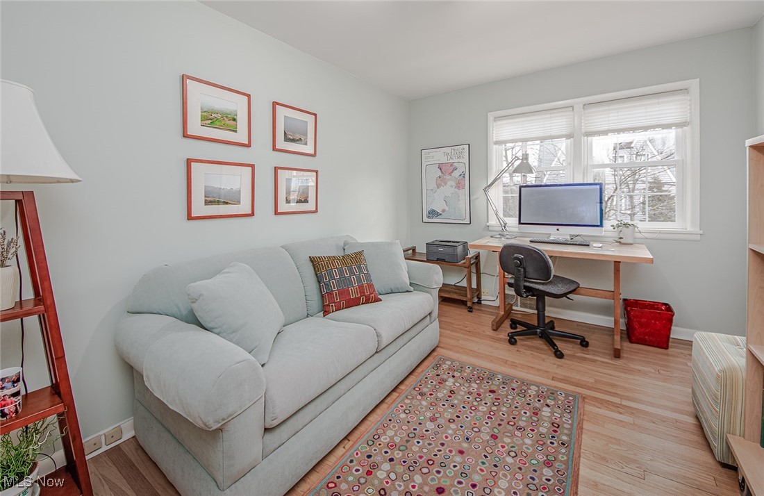 696 Ecton Road Akron, OH 44303 - Photo 23 of 41 The third bedroom is currently being utilized as an office. Once again, soothing paint colors and the refinished hardwood floors.