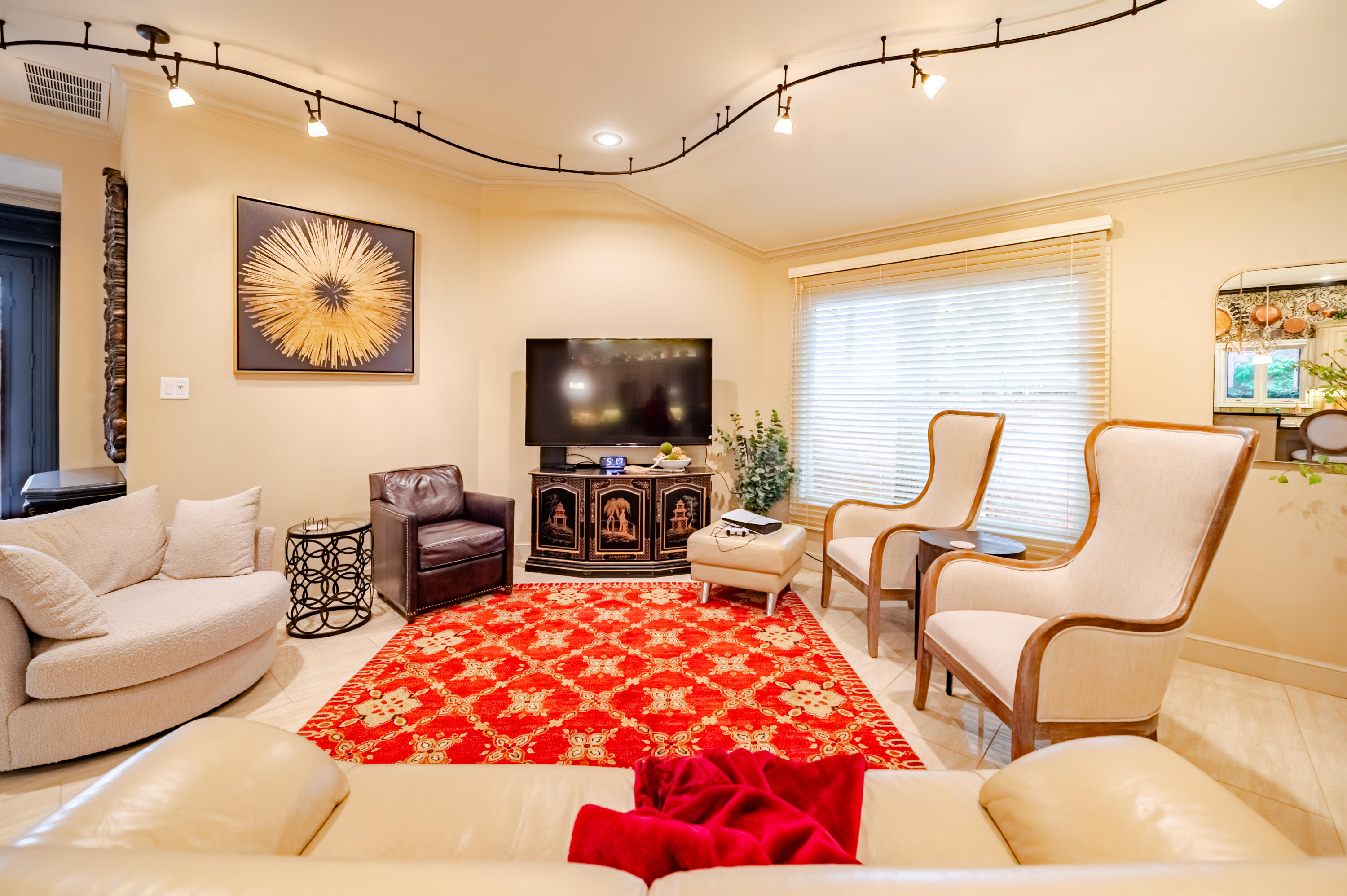 4226 97th Place Lubbock, TX 79423 - Photo 15 of 52 a living room with furniture and a flat screen tv