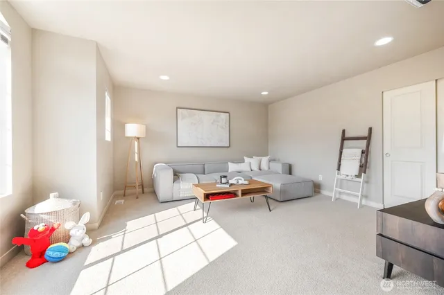 a bedroom with furniture and a couch