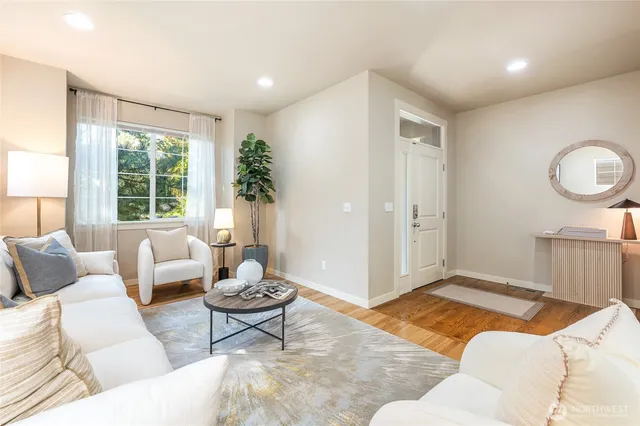 a living room with furniture and window