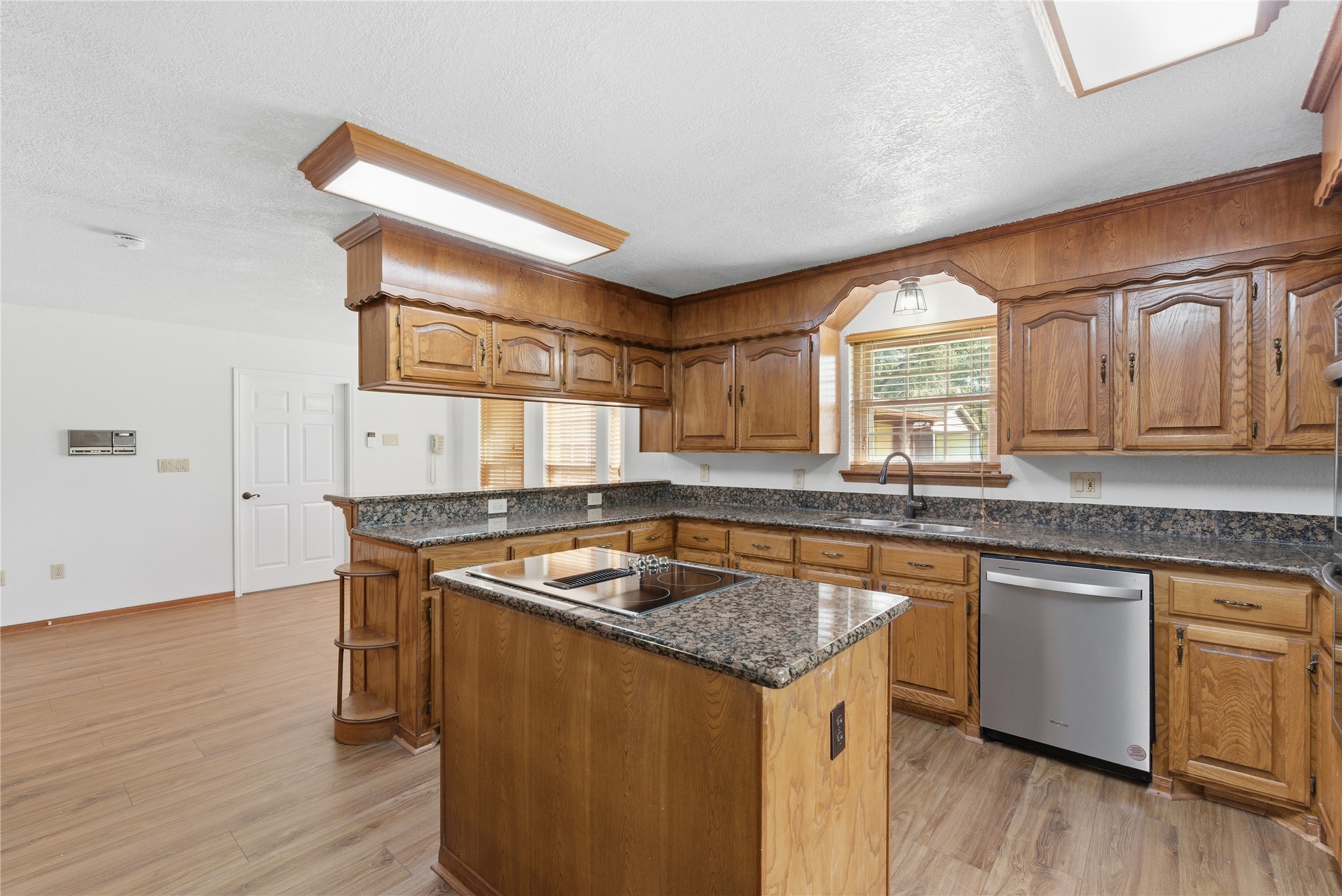 436 County Road 502A Sweeny, TX 77480 - Photo 15 of 45 a kitchen that has a sink and a stove in it