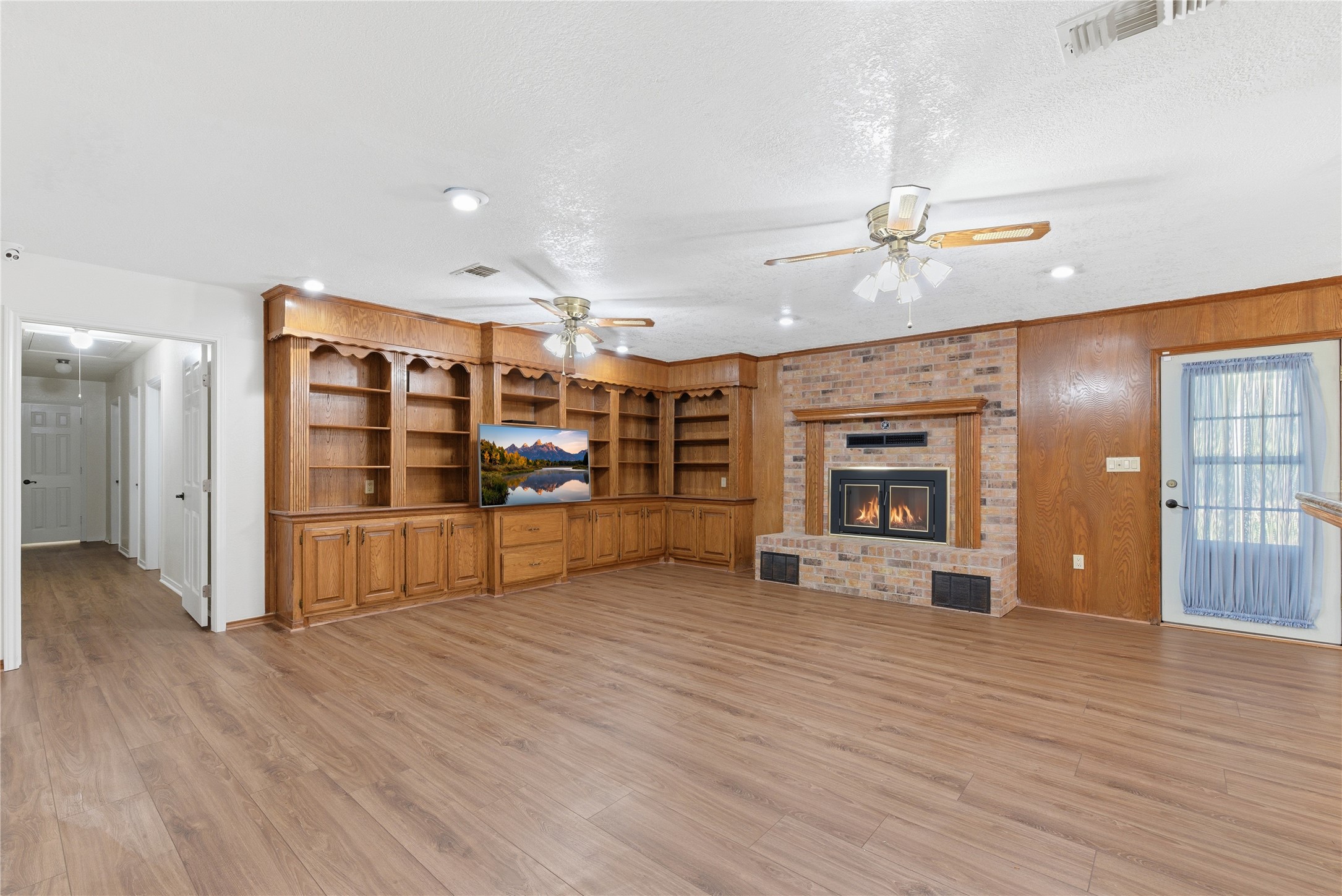436 County Road 502A Sweeny, TX 77480 - Photo 22 of 45 a view of a room with wooden floor and window