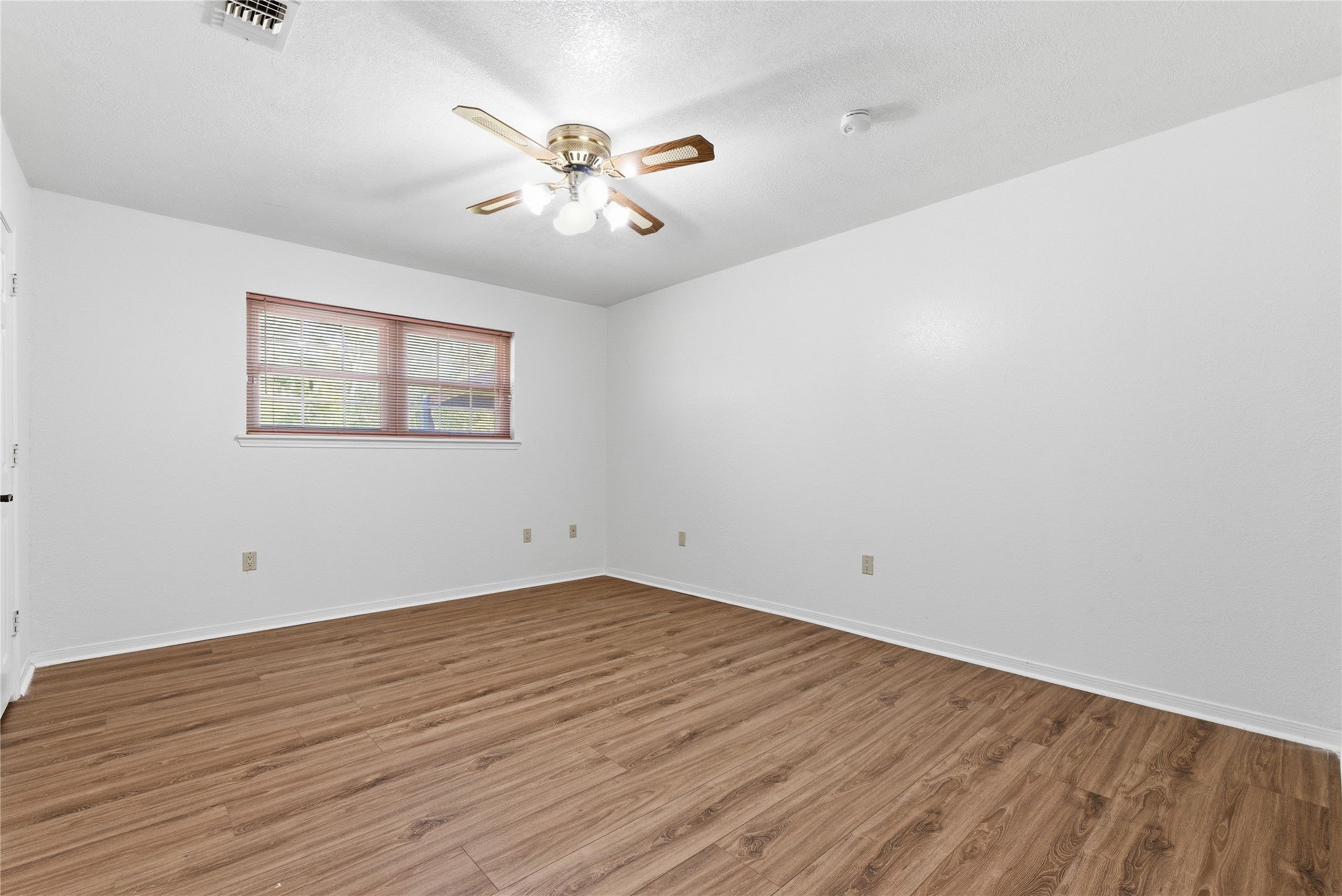 436 County Road 502A Sweeny, TX 77480 - Photo 32 of 45 wooden floor in an empty room