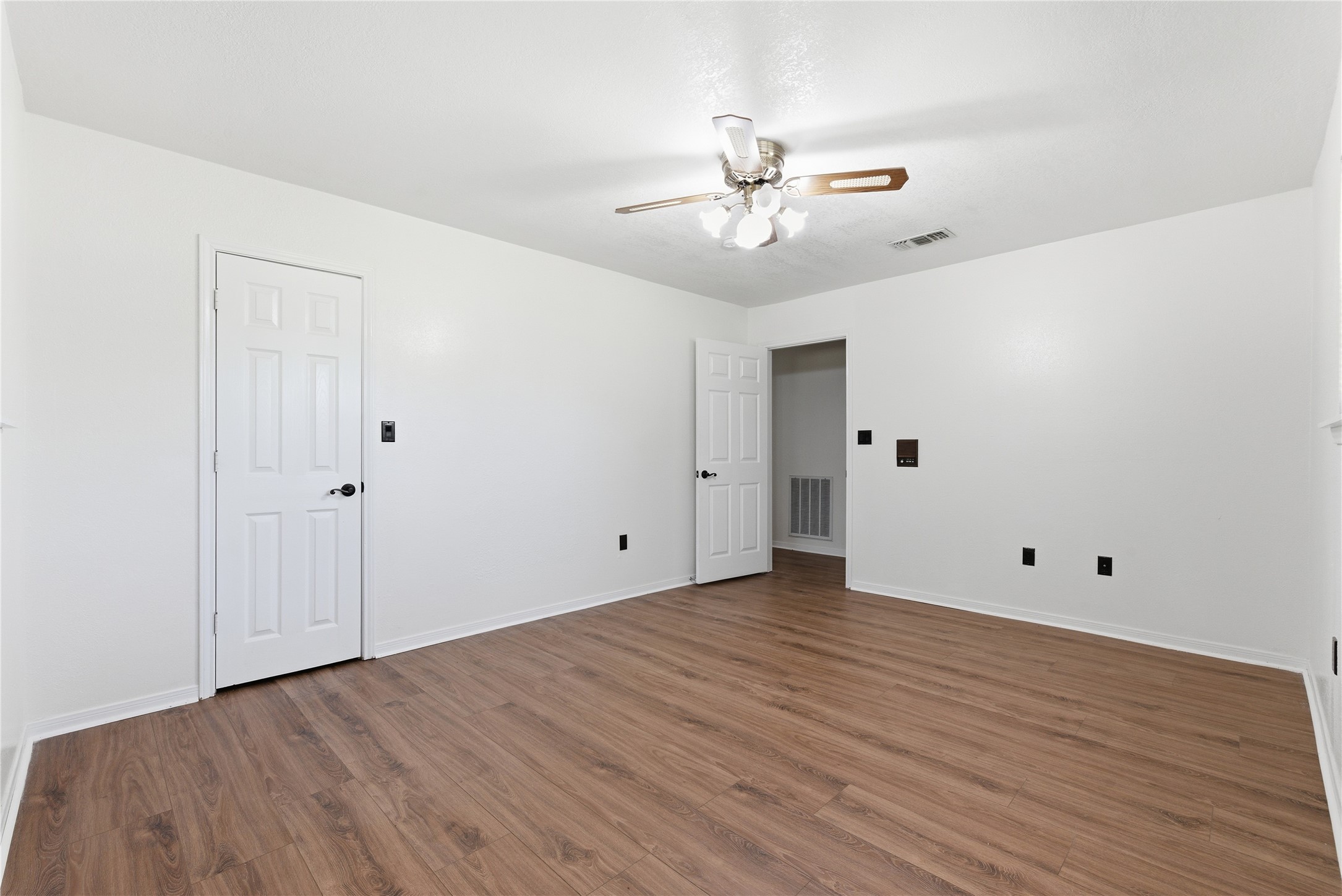 436 County Road 502A Sweeny, TX 77480 - Photo 34 of 45 a view of an empty room with wooden floor