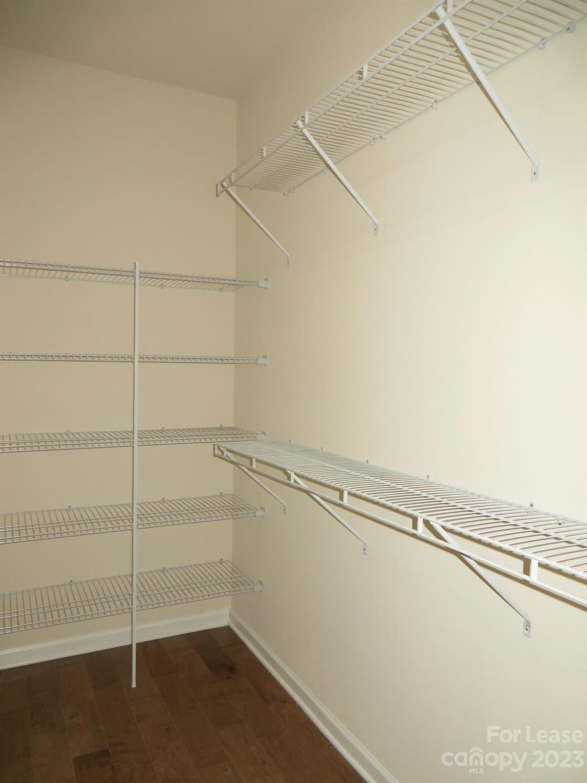 5107 Waterloo Drive Tega Cay, SC 29708 - Photo 18 of 25 a view of a room with racks on the wall