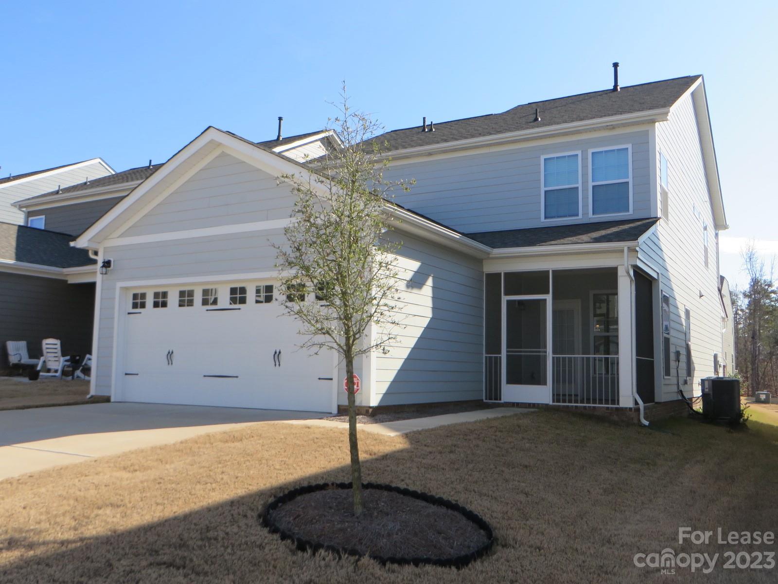 5107 Waterloo Drive Tega Cay, SC 29708 - Photo 25 of 25 a house with trees in front of it