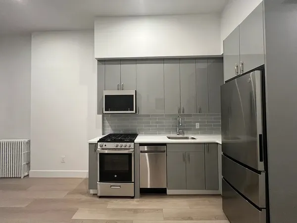 a picture of a bathroom with a shower curtain and a