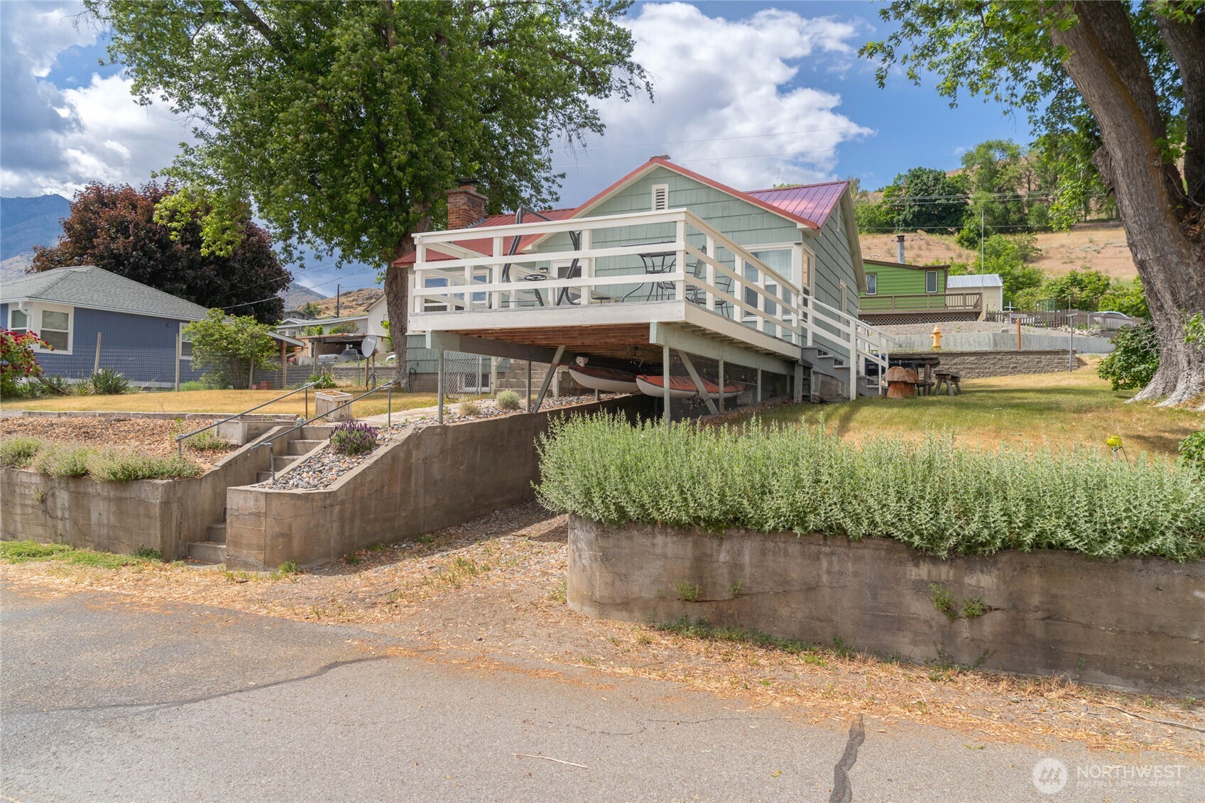 462 Beach Street Pateros, WA 98846 - Photo 27 of 30 front view of a house with a lake view