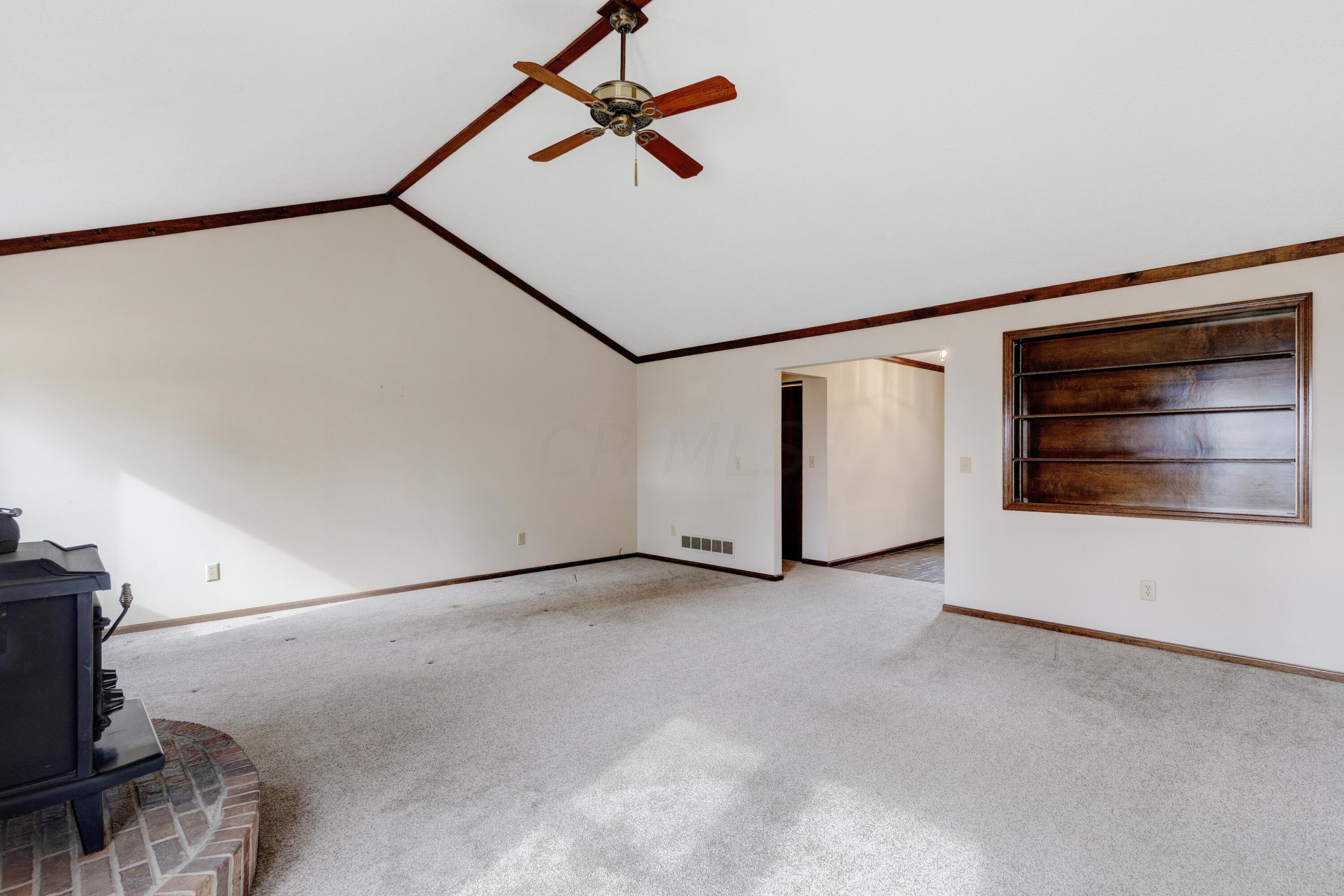 2571 Youngs Grove Road Columbus, OH 43231 - Photo 7 of 40 Ceiling fan and build in shelving