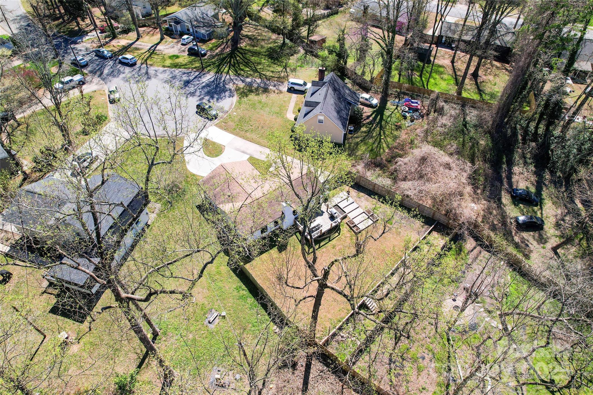 5501 Joyce Drive Charlotte, NC 28215 - Photo 35 of 35 a backyard of a house with lots of green space