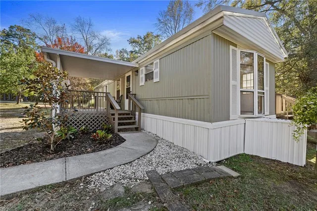 a view of balcony with wooden floor