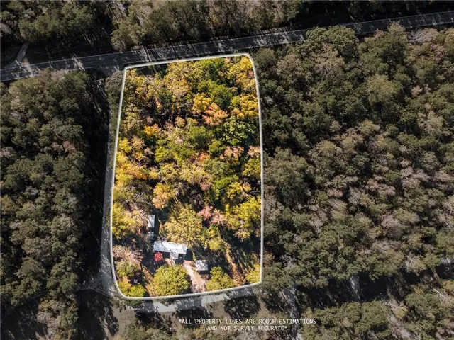 an aerial view of lake and residential houses