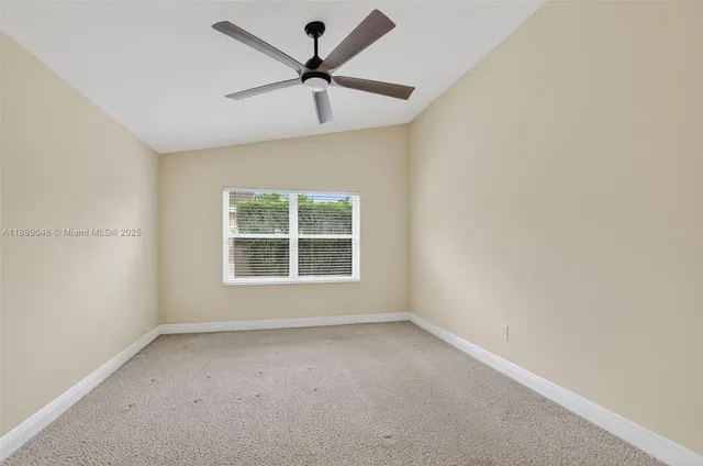 a bathroom with a tub a sink shower and mirror