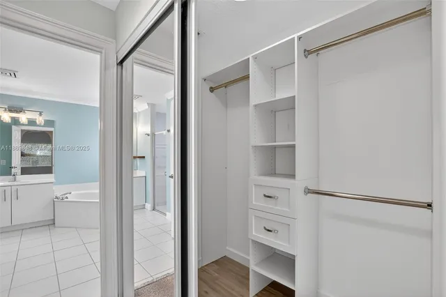 a bathroom with a sink and a bathtub