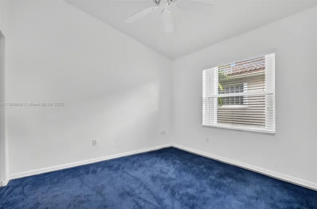 a view of a back yard of the house