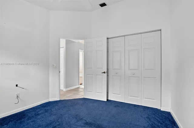 a view of a back yard of the house