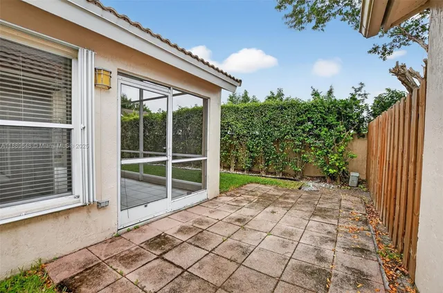 a view of swimming pool with outdoor seating and deck