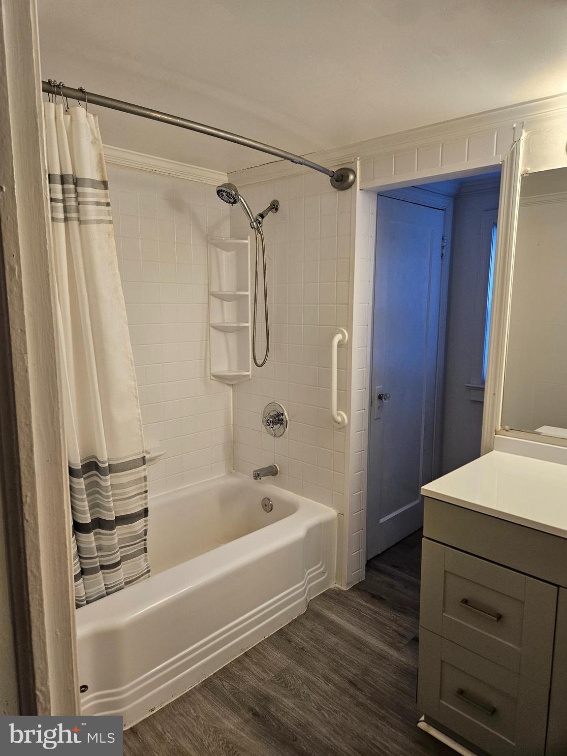 7204 Webster Lane Fort Washington, MD 20744 - Photo 12 of 27 a bathroom with a bathtub a sink and a shower