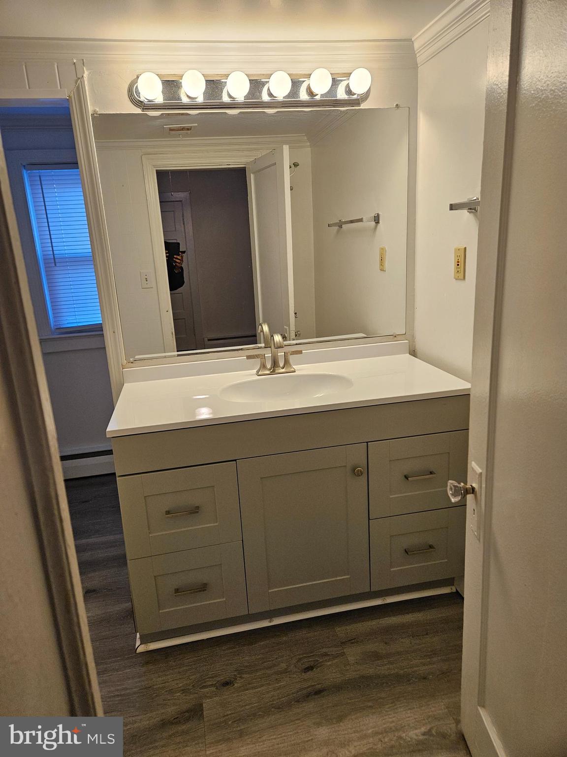 7204 Webster Lane Fort Washington, MD 20744 - Photo 13 of 27 a bathroom with a sink and a mirror