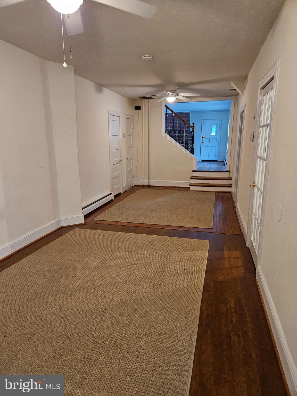 7204 Webster Lane Fort Washington, MD 20744 - Photo 5 of 27 a view of a hallway with wooden floor