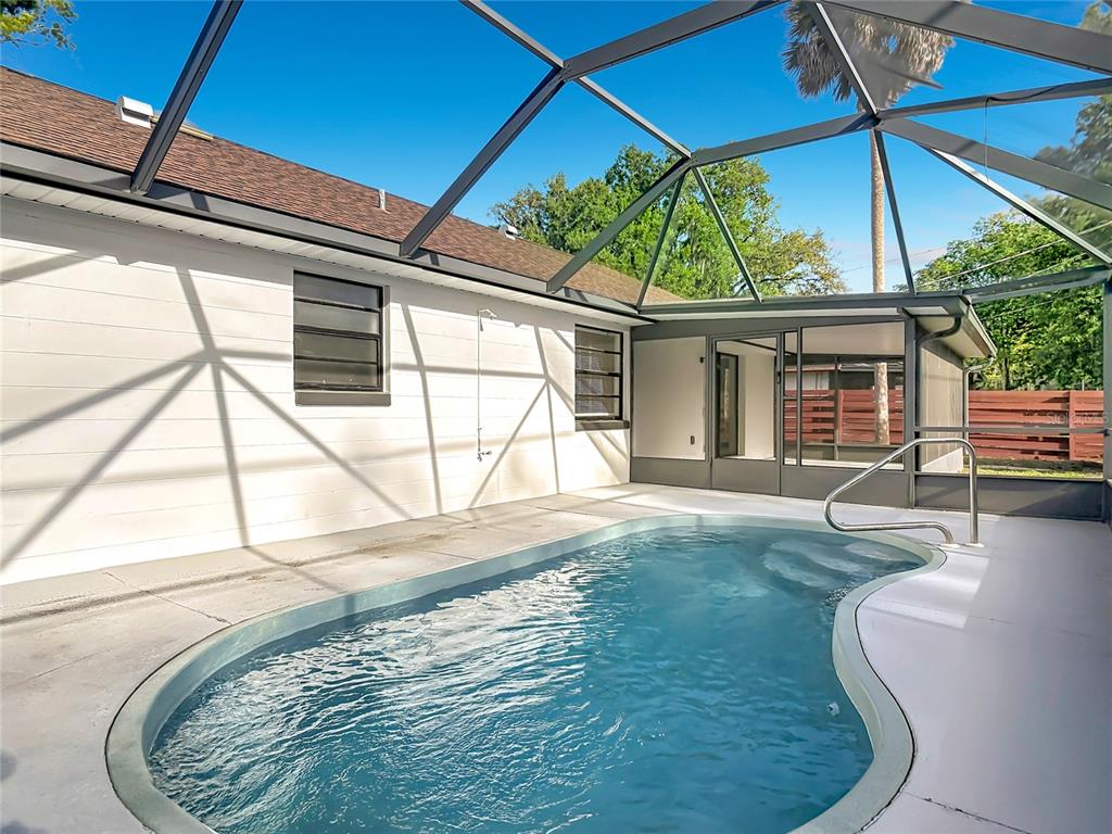 612 Devon Street Port Orange, FL 32127 - Photo 28 of 34 a view of a backyard with a patio