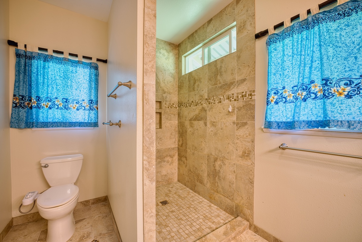 127 Opio Road Hilo, HI 96720 - Photo 8 of 21 a bathroom with a toilet and a shower