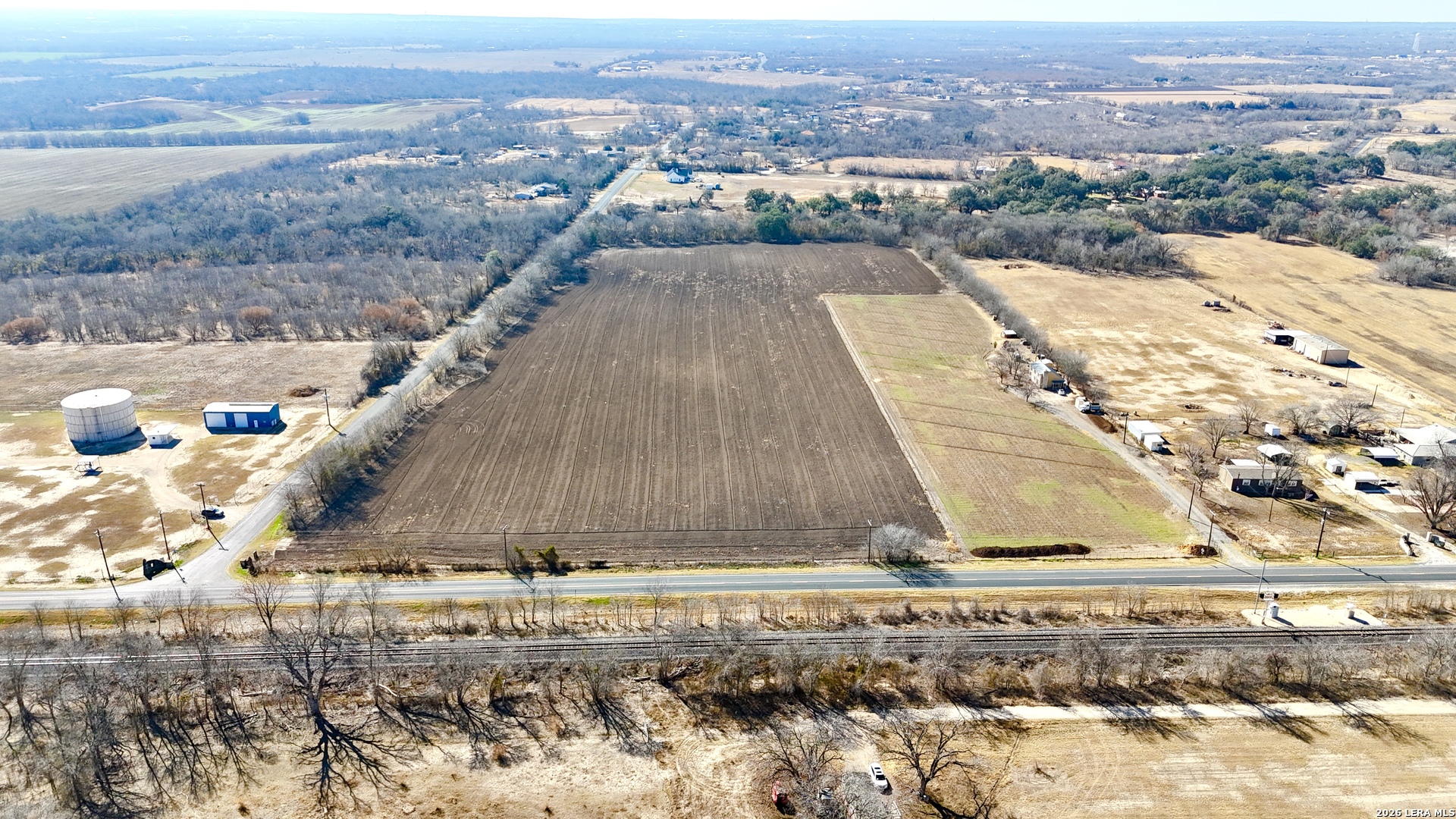 13310 Macdona Lacoste Road Atascosa, TX 78002 - Photo 12 of 15 a view of a city from a terrace