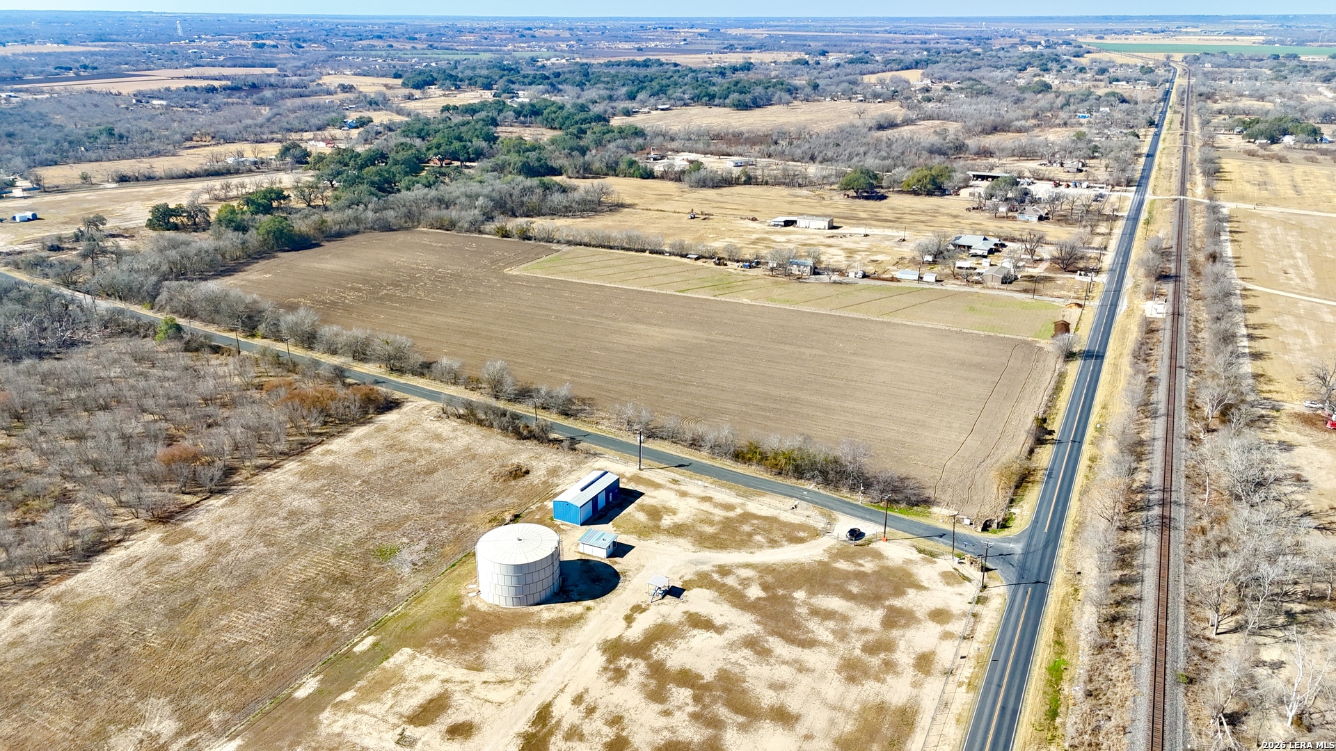 13310 Macdona Lacoste Road Atascosa, TX 78002 - Photo 13 of 15 a view of a city from a terrace