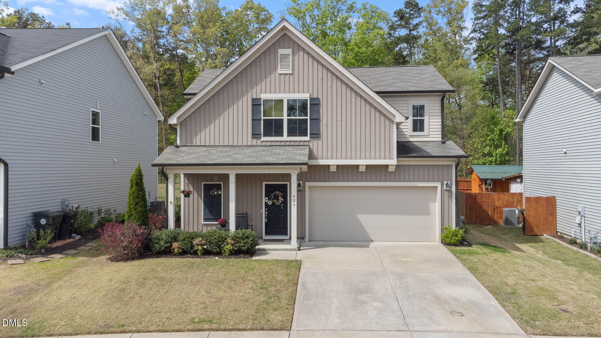 429 Mockingbird Lane Mebane, NC 27302 - Photo 1 of 44 a front view of a house with yard