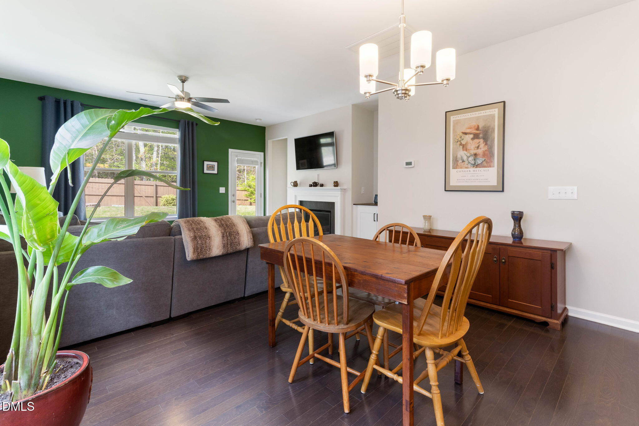 429 Mockingbird Lane Mebane, NC 27302 - Photo 10 of 44 a view of a dining room with furniture window and wooden floor