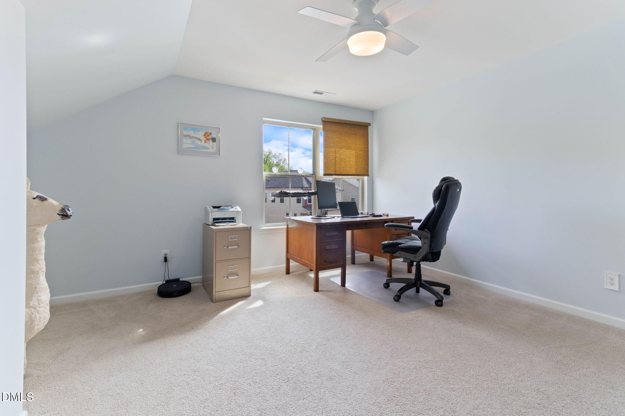 429 Mockingbird Lane Mebane, NC 27302 - Photo 16 of 44 a view of a workspace with furniture and a window