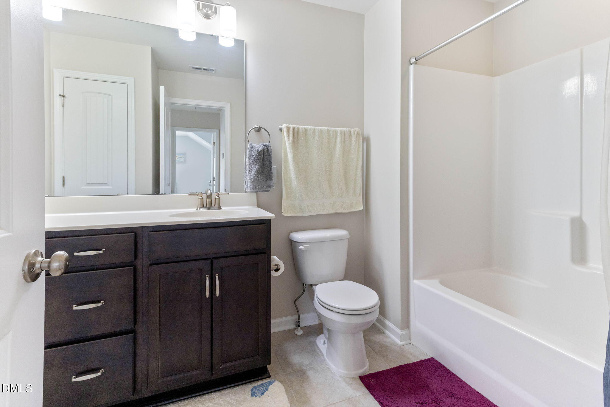 429 Mockingbird Lane Mebane, NC 27302 - Photo 21 of 44 a bathroom with a sink a toilet and shower
