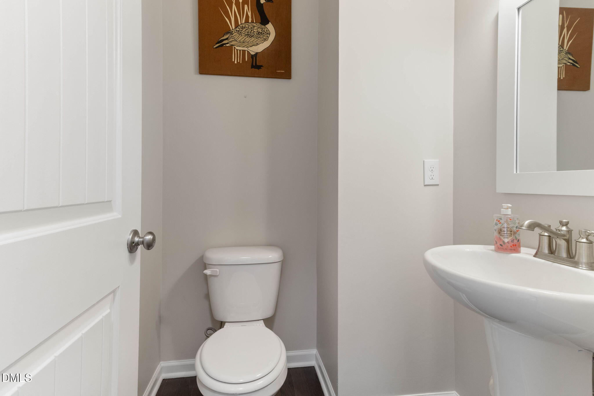 429 Mockingbird Lane Mebane, NC 27302 - Photo 27 of 44 a bathroom with a toilet sink and mirror