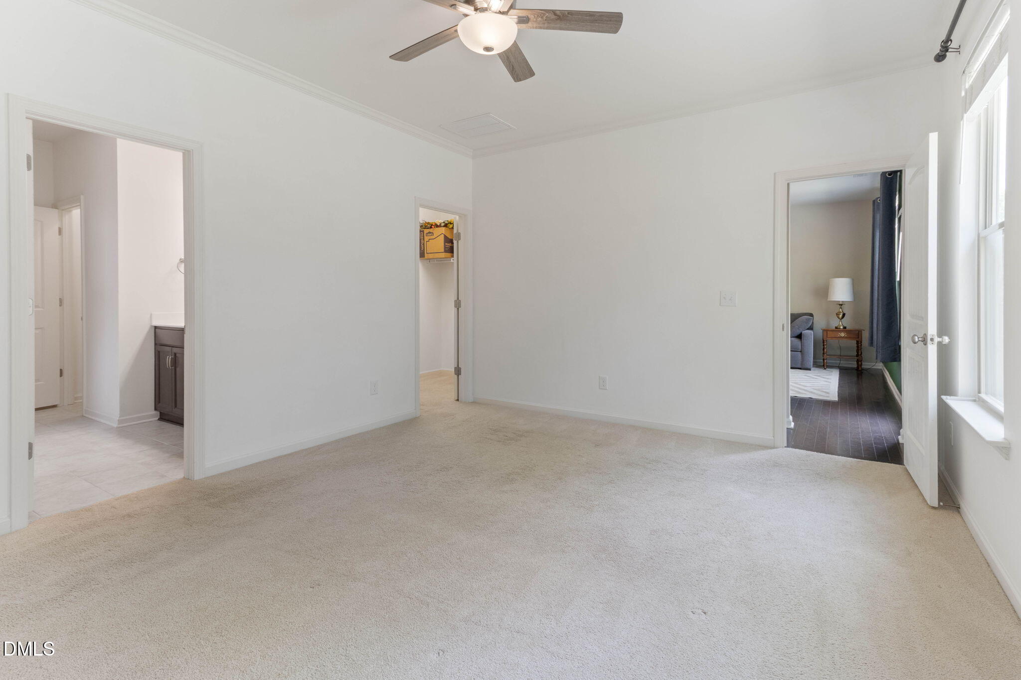 429 Mockingbird Lane Mebane, NC 27302 - Photo 29 of 44 an empty room with fan and entrance
