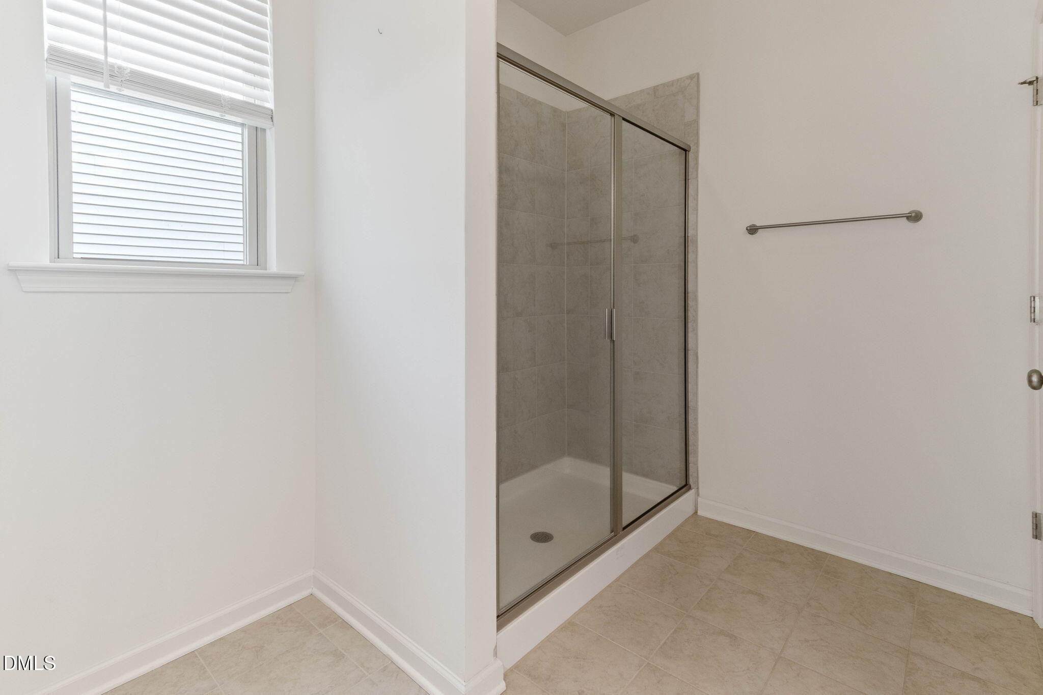 429 Mockingbird Lane Mebane, NC 27302 - Photo 35 of 44 a bathroom with a glass shower door