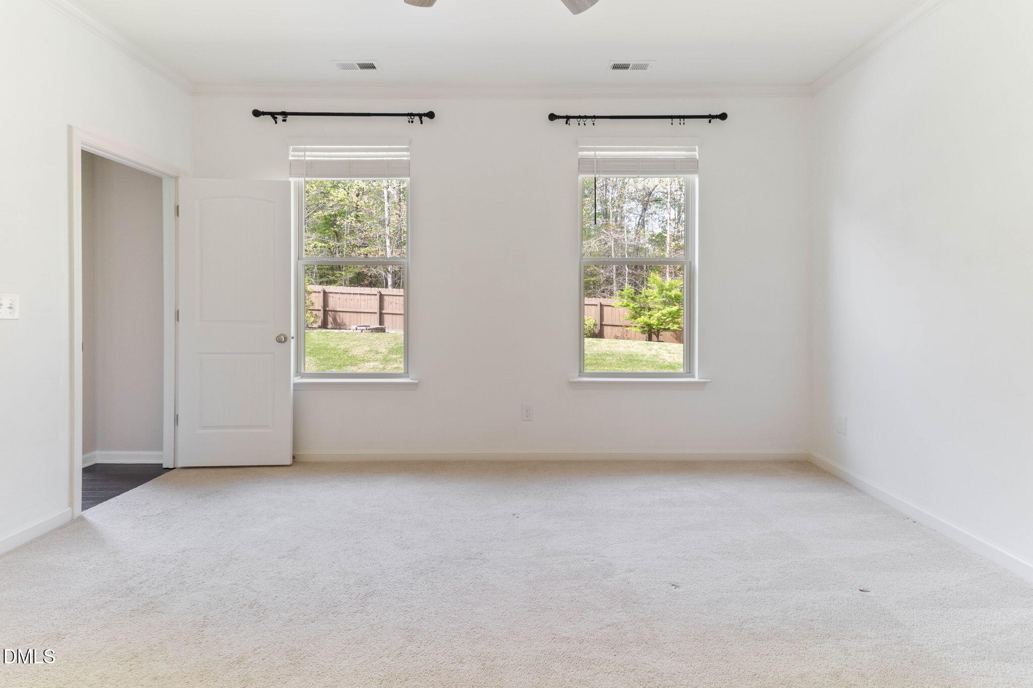 429 Mockingbird Lane Mebane, NC 27302 - Photo 37 of 44 an empty room with windows