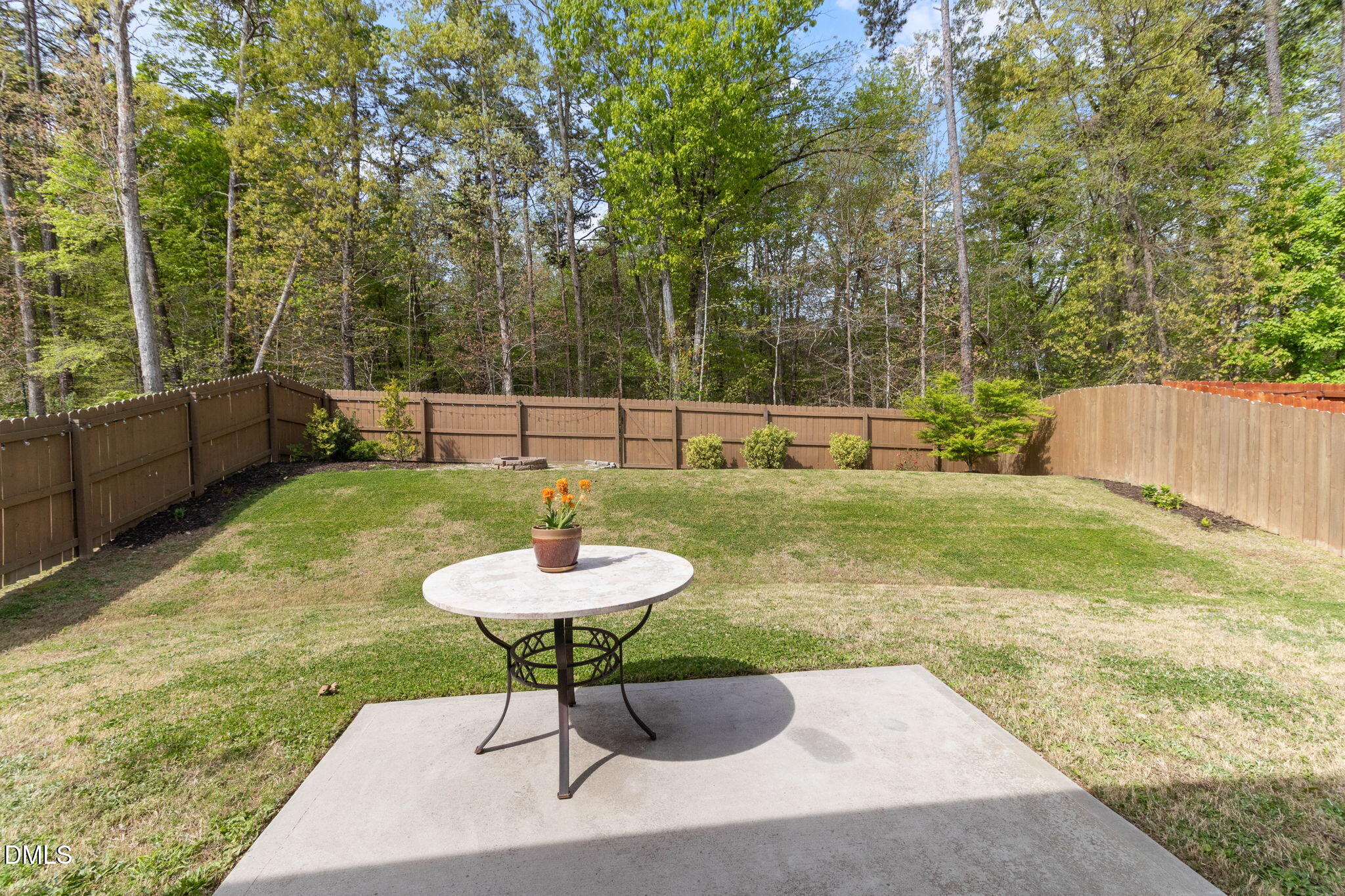 429 Mockingbird Lane Mebane, NC 27302 - Photo 38 of 44 a swimming pool with some trees in the background