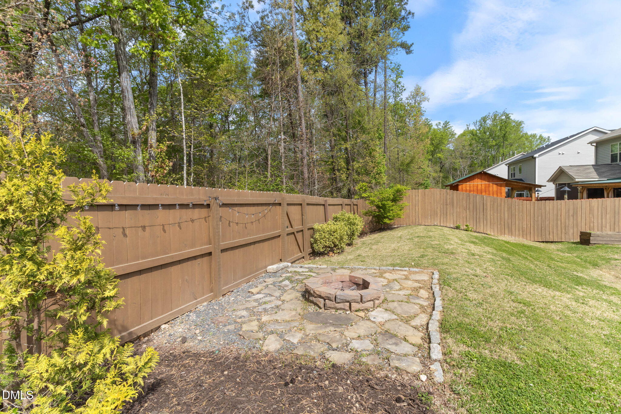 429 Mockingbird Lane Mebane, NC 27302 - Photo 39 of 44 a view of backyard and tree