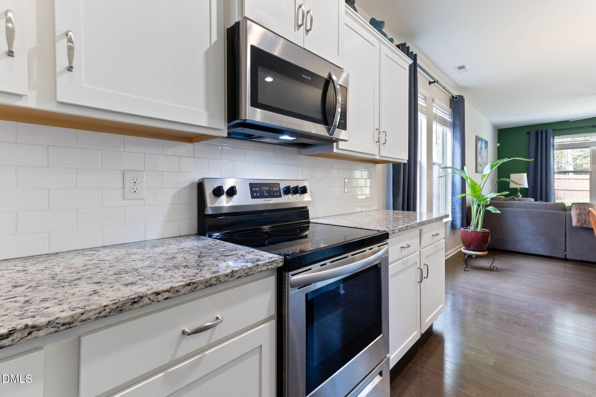 429 Mockingbird Lane Mebane, NC 27302 - Photo 9 of 44 a kitchen with stainless steel appliances granite countertop a sink and a stove