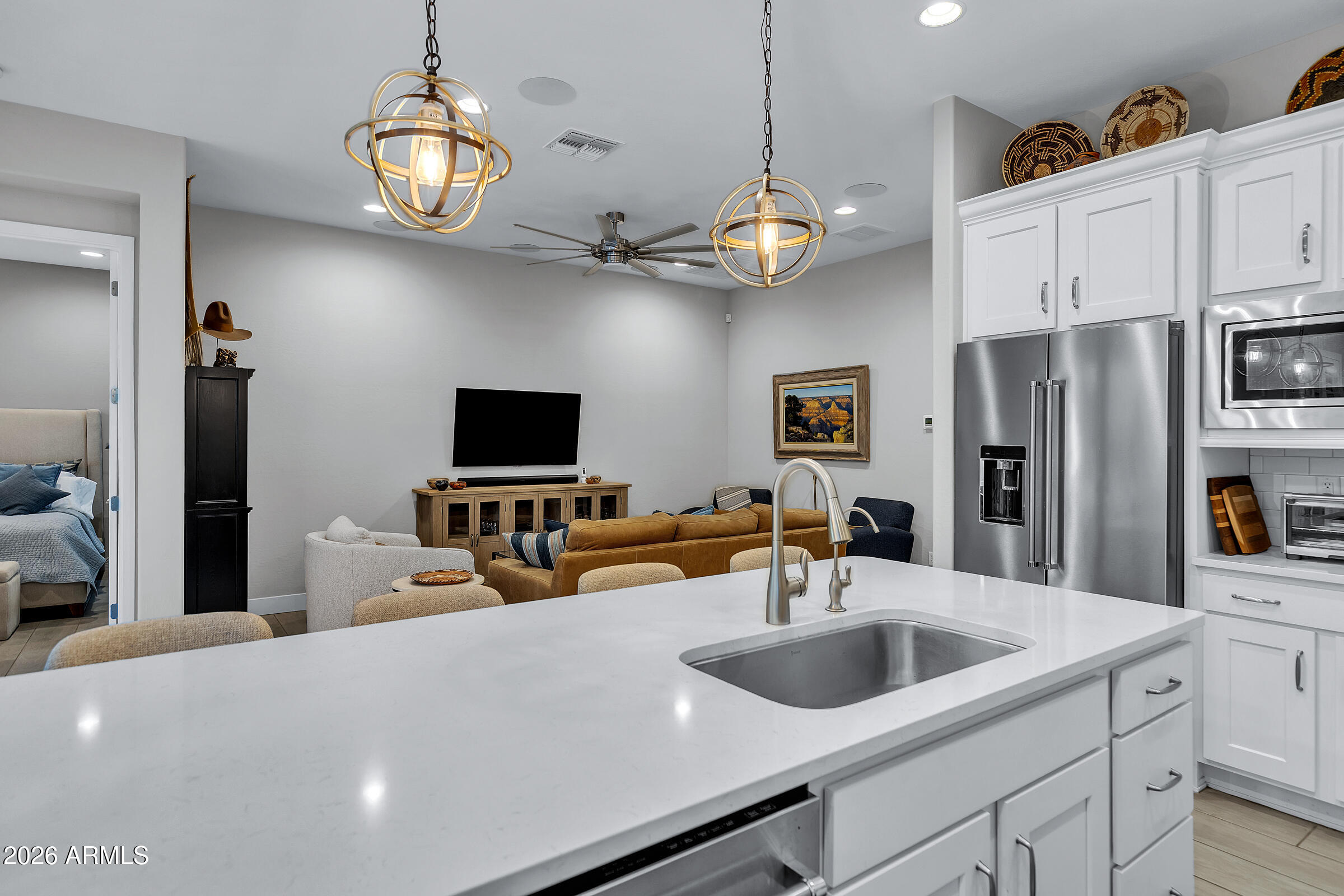 622 West Deer Creek Road Phoenix, AZ 85048 - Photo 10 of 39 a view of a kitchen center island and stainless steel appliances