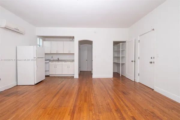 a view of kitchen with wooden floor