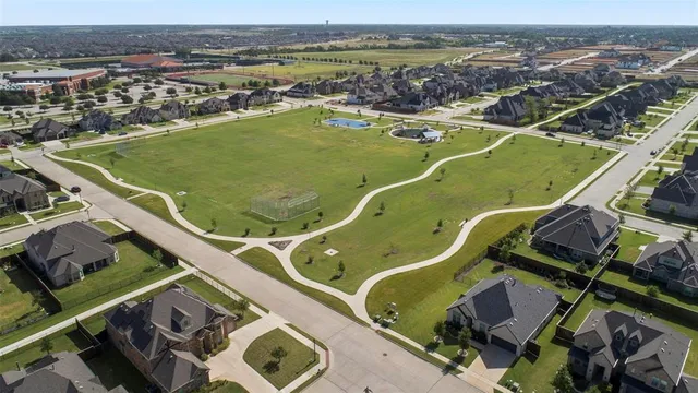 an aerial view of a tennis ground