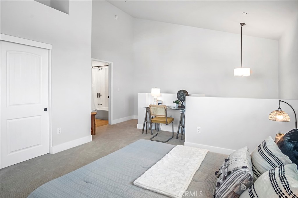 10035 South Western Avenue, Unit 101 Los Angeles, CA 90047 - Photo 11 of 22 a bed room with a bed and furniture