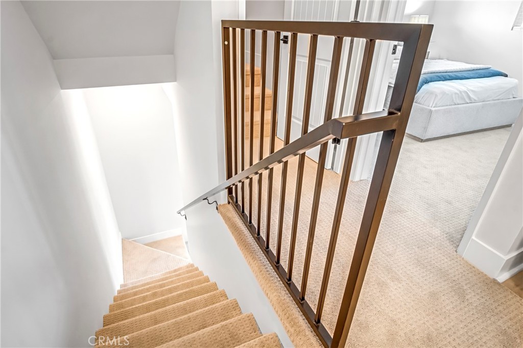 10035 South Western Avenue, Unit 101 Los Angeles, CA 90047 - Photo 8 of 22 a view of a staircase in a living room
